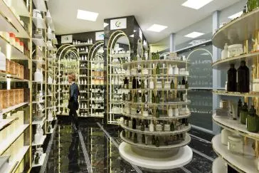 pharmacy rendered image with lady looking at products