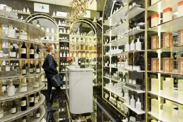 pharmacy rendered image with products and a lady